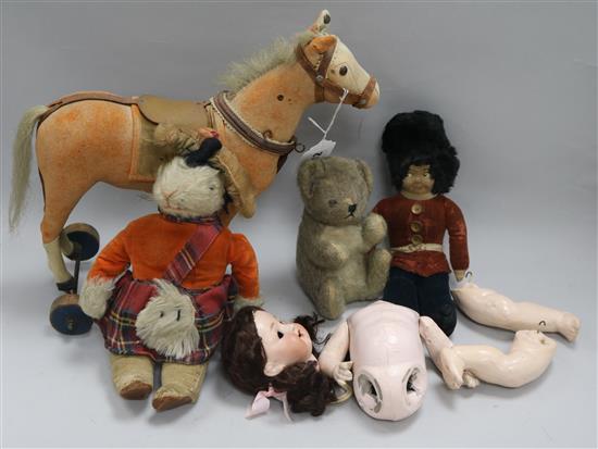 A Steiff felt horse on wheels, circa 1920 and a small quantity of other toys
